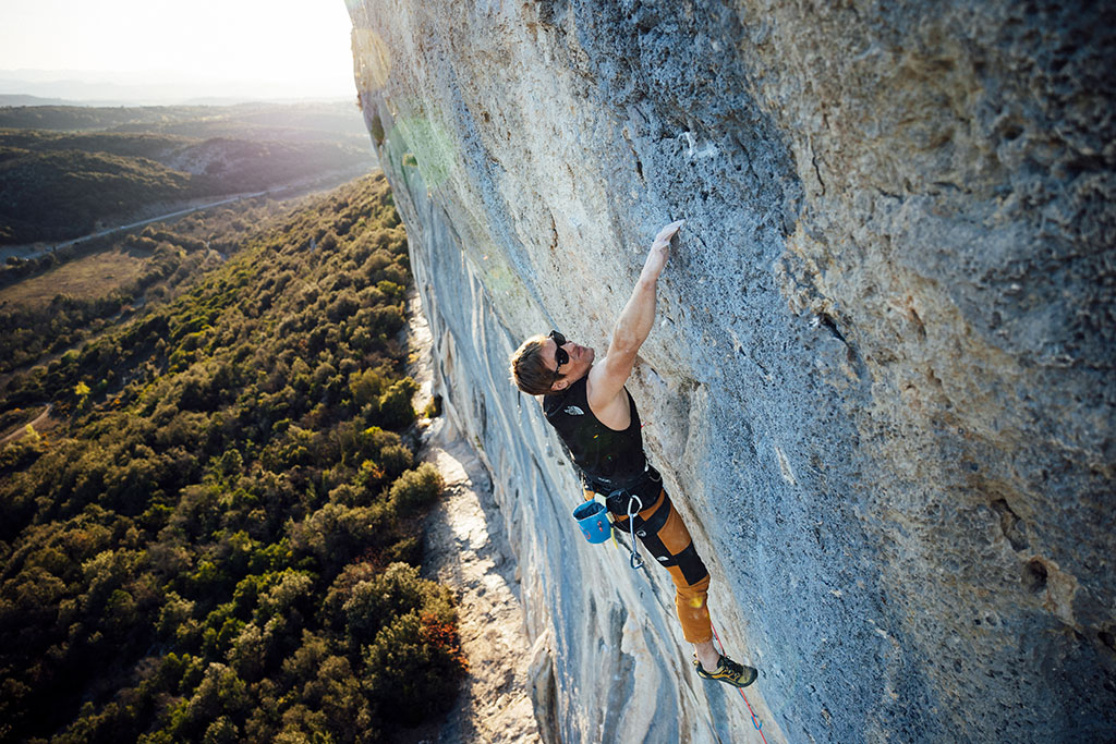 James Pearson climbing Ça Chauffe (F9a) at Seynes in France. Photo: Raphaël Fourau/Wild Country